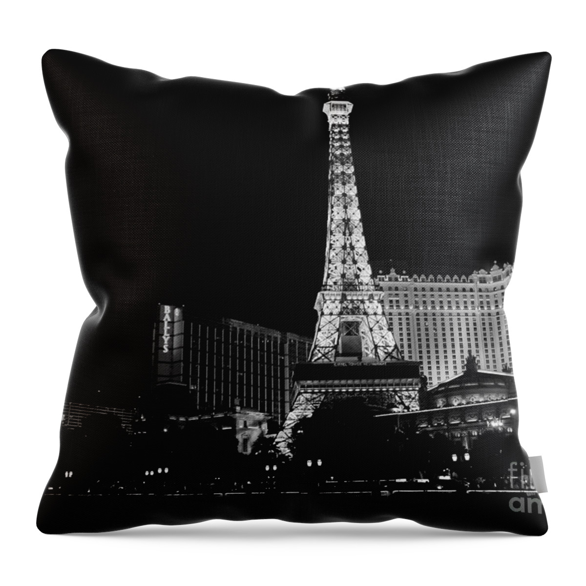 Eiffel Tower Throw Pillow featuring the photograph The Nightlife black and white by Mary Lou Chmura