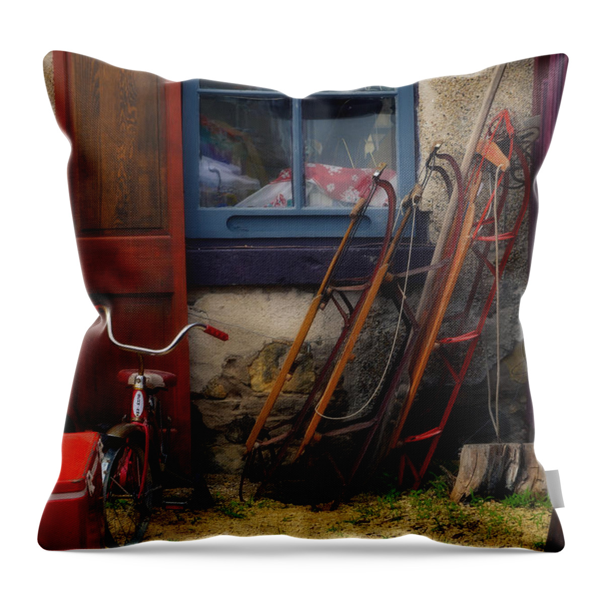 The Old Sleds Throw Pillow featuring the photograph The Old Sleds by Mary Machare