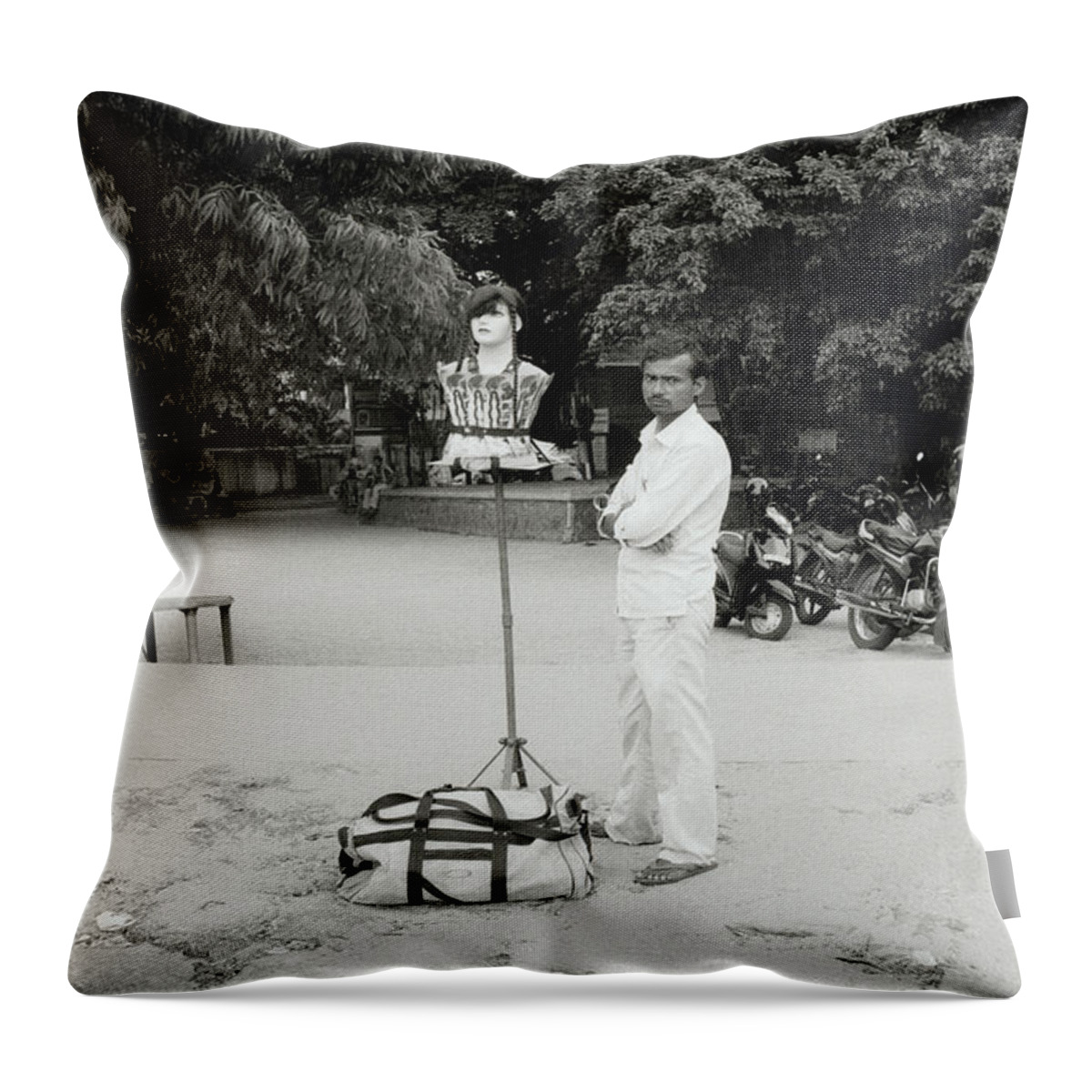 Eccentric Throw Pillow featuring the photograph The Wig Seller by Shaun Higson