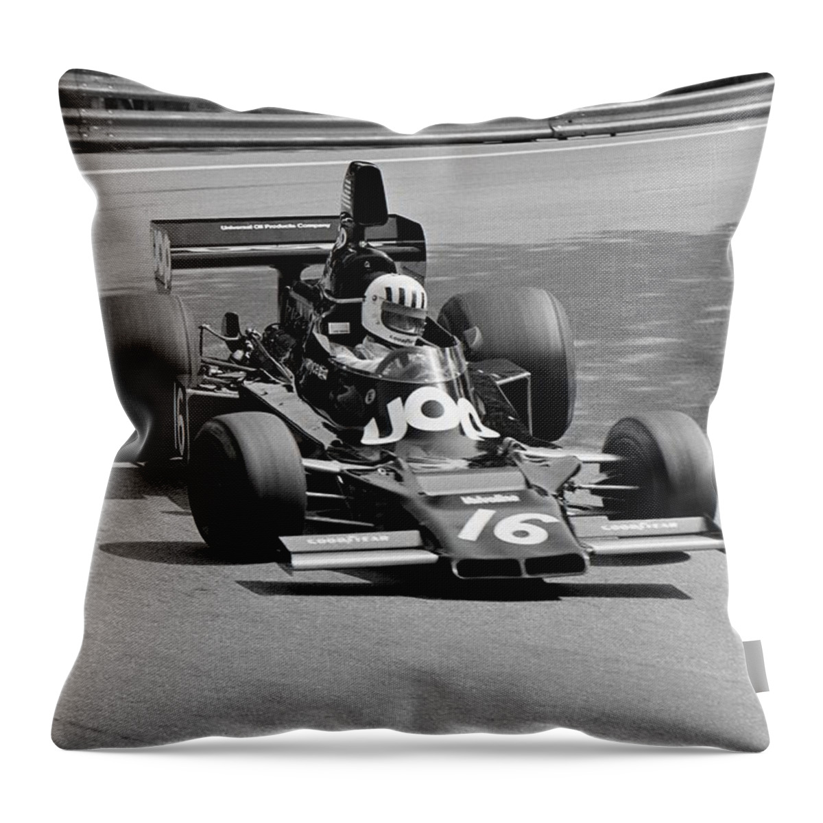 Formula 1 Throw Pillow featuring the photograph Tom Pryce. 1975 Spanish Grand Prix by Oleg Konin
