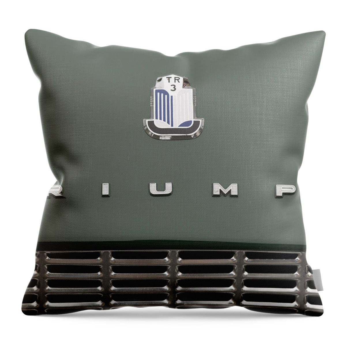 Triumph Throw Pillow featuring the photograph TR3 Hood Ornament and Grill by Scott Campbell