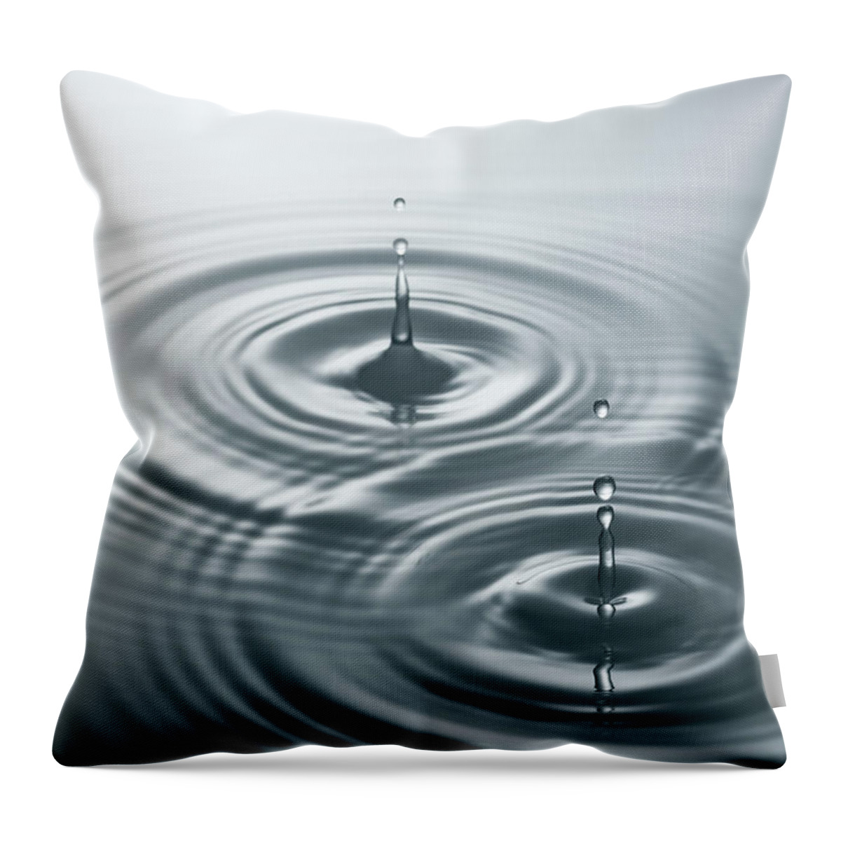 Tranquility Throw Pillow featuring the photograph Two Long Droplets In Dark Water by Anthony Bradshaw