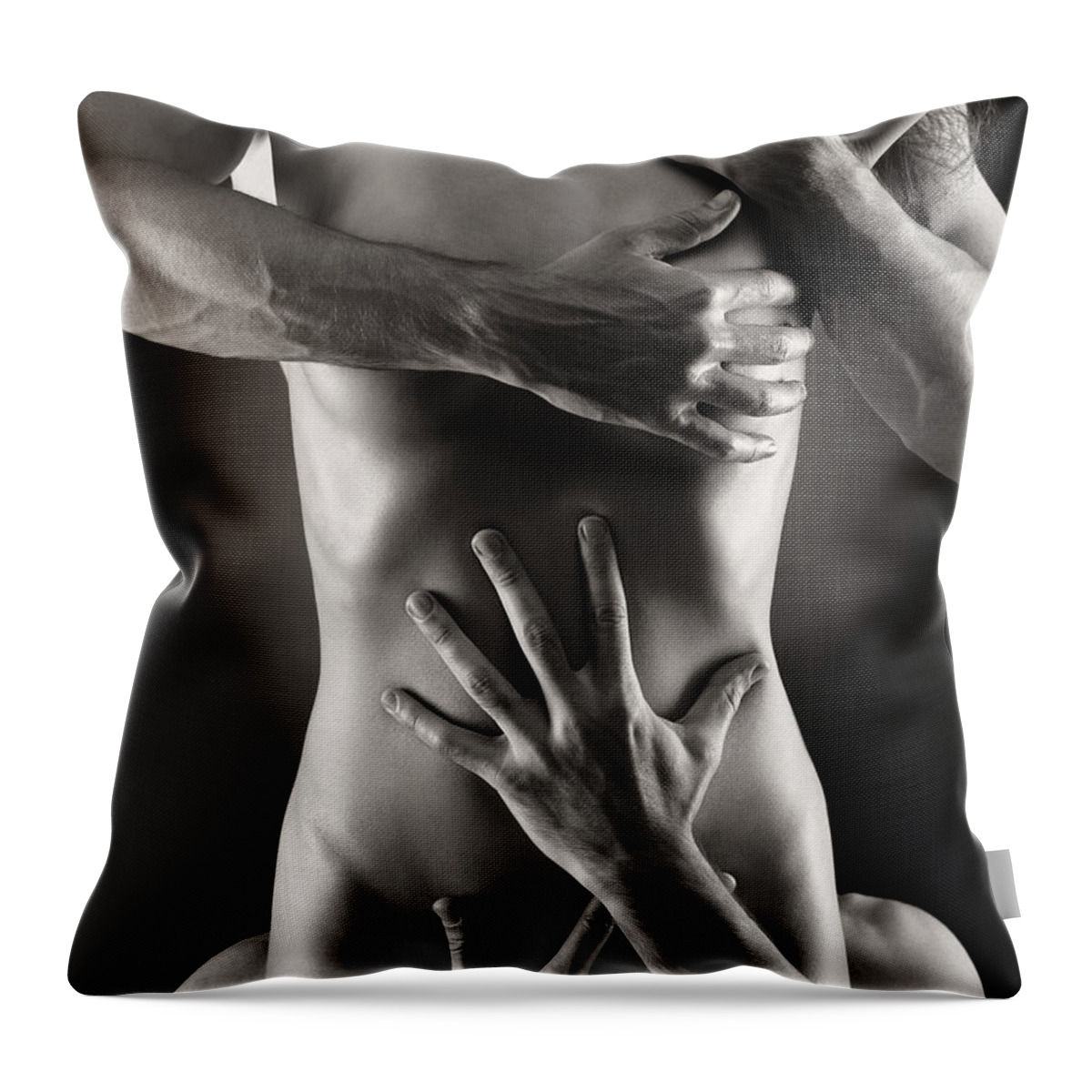 Sensual Throw Pillow featuring the photograph Two men embracing naked woman by Maxim Images Exquisite Prints