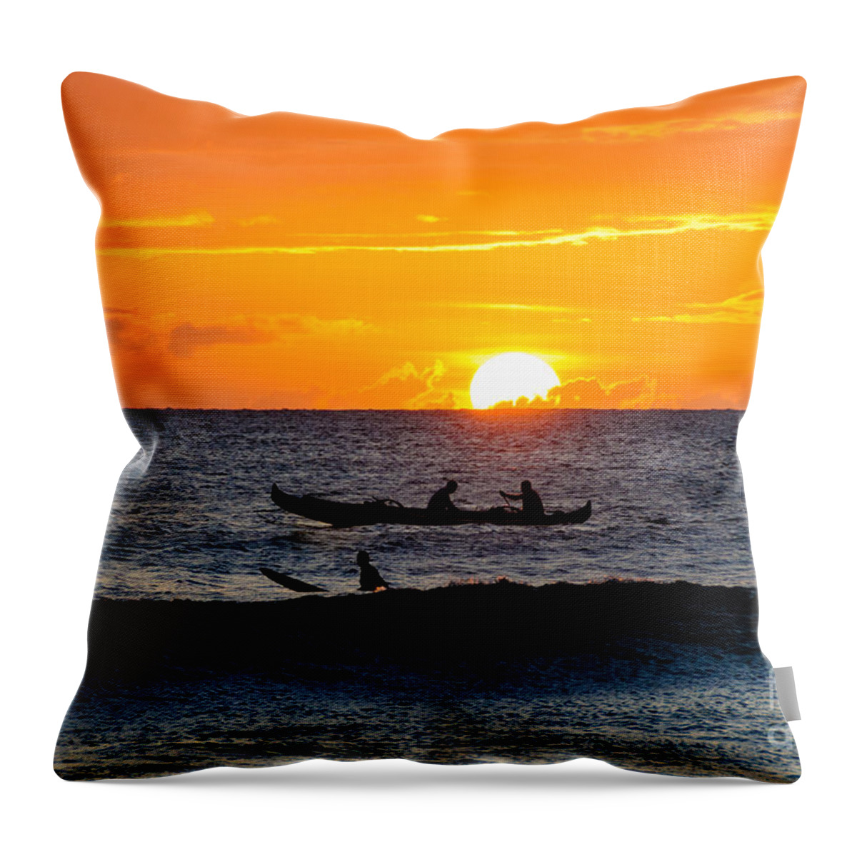 Hawaii Throw Pillow featuring the photograph Two men paddling a Hawaiian outrigger canoe at sunset on Maui by Don Landwehrle