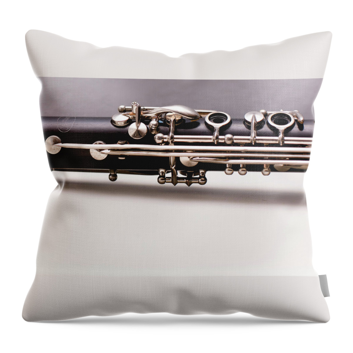 Clarinet Throw Pillow featuring the photograph Upper-middle Portion Of A B Flat by Jennifer M. Ramos
