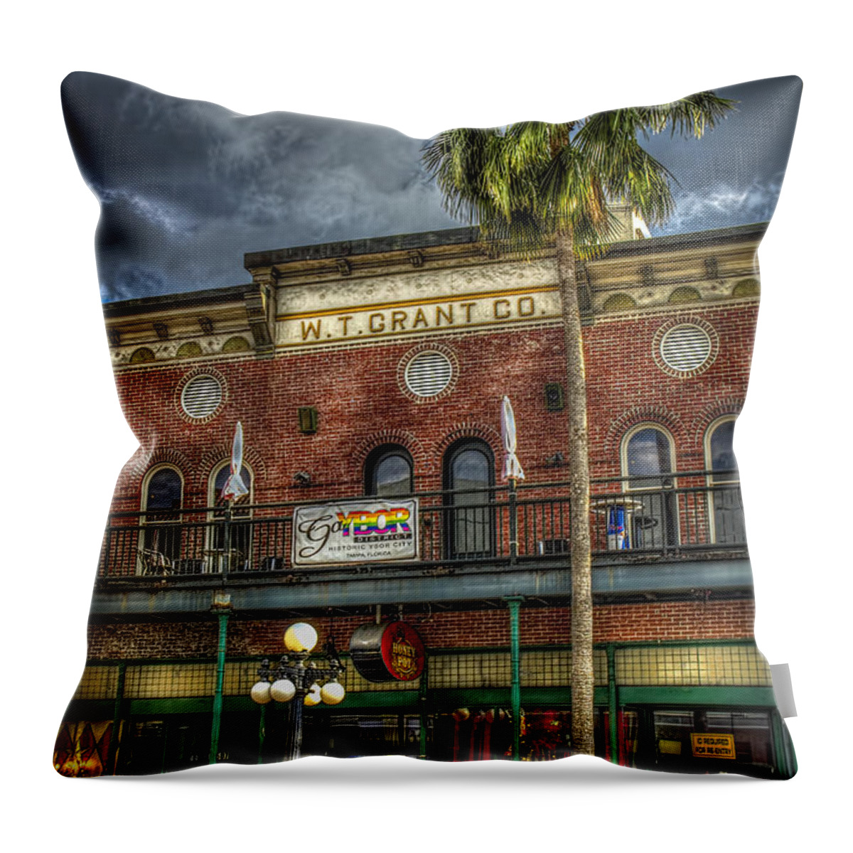 Old Building Throw Pillow featuring the photograph W. T. Grant Co. by Marvin Spates