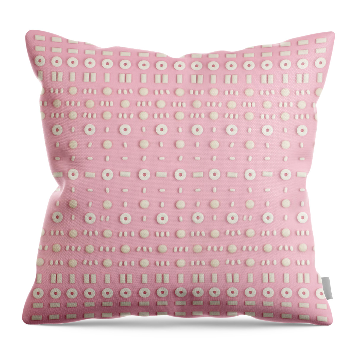 In A Row Throw Pillow featuring the photograph White Candies Arranged In A Pattern by Juj Winn