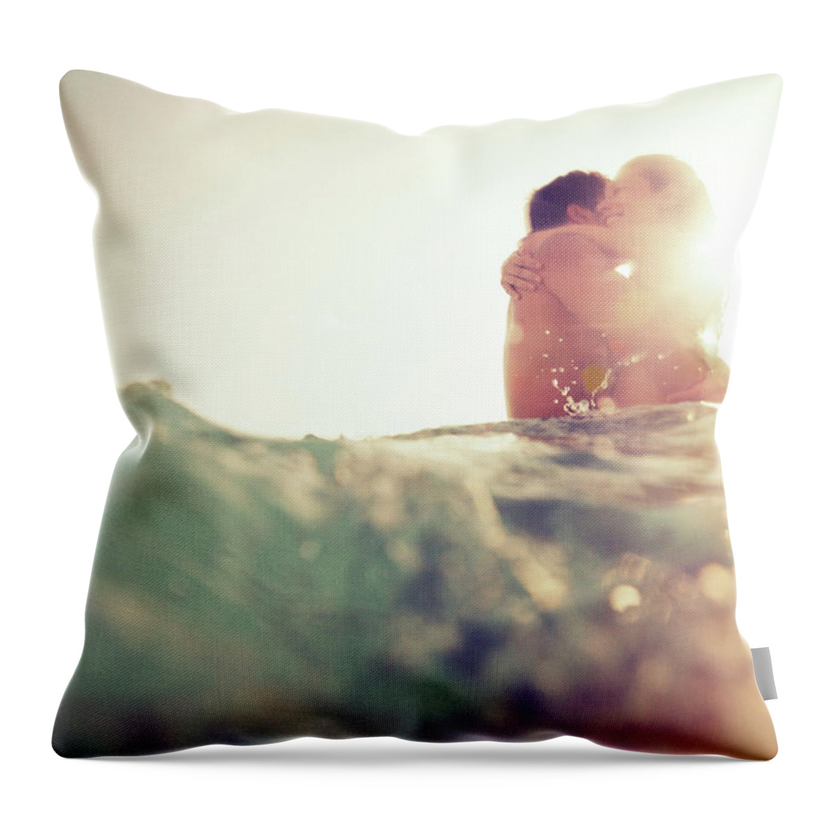 Young Men Throw Pillow featuring the photograph Young Couple Having Fun In The Sea by Nullplus