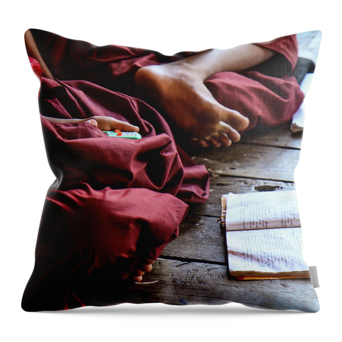 Hiding Throw Pillow featuring the photograph Young Monk Playing With A Toy by Gary Koh, Singapore