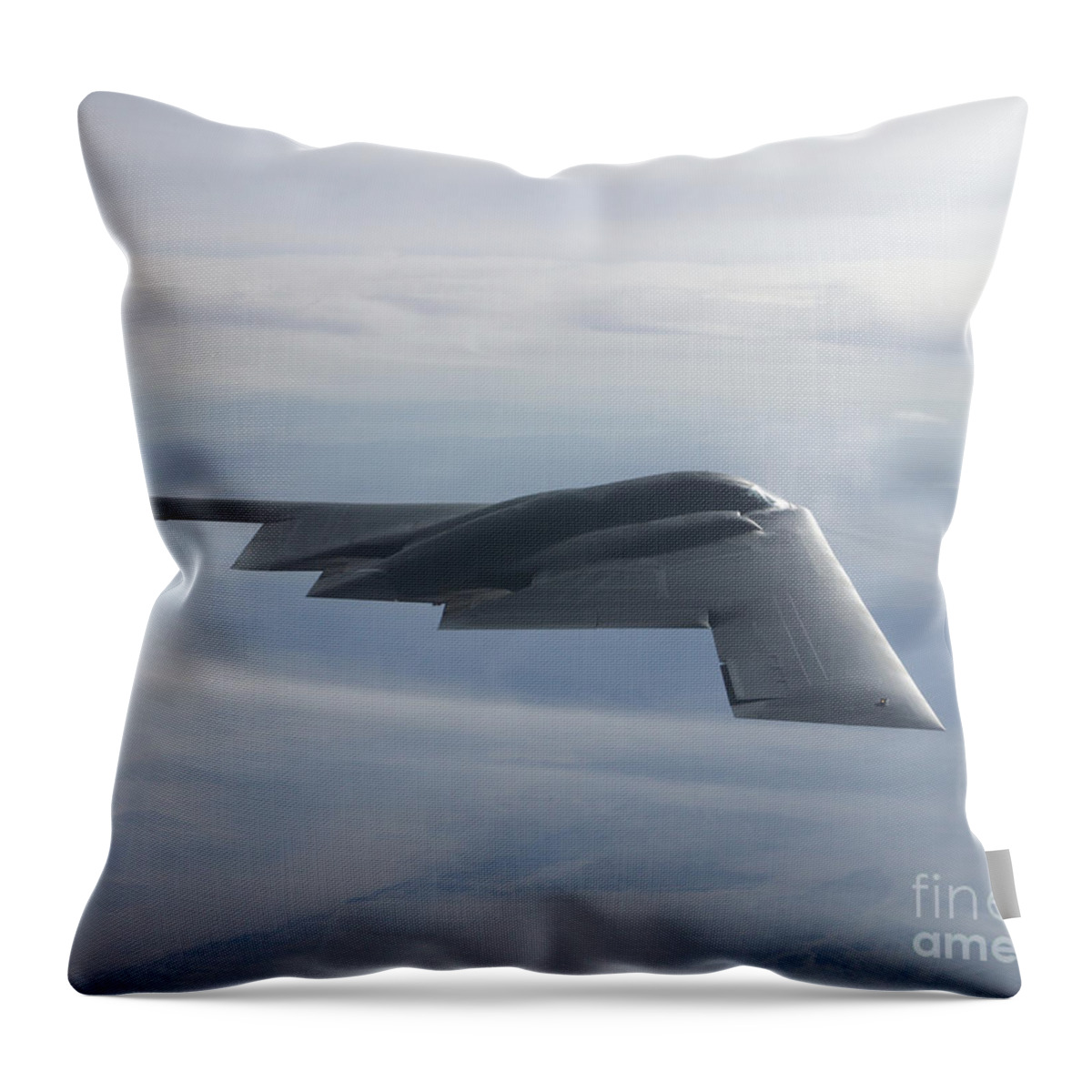 B-2 Spirit Throw Pillow featuring the photograph A B-2 Spirit Soars Through The Sky #1 by Stocktrek Images