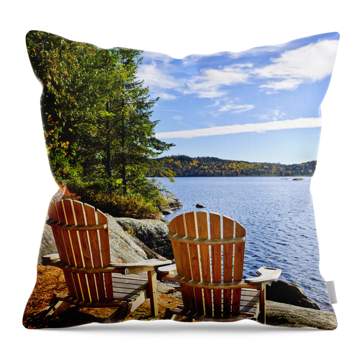 Chairs Throw Pillow featuring the photograph Adirondack chairs at lake shore 3 by Elena Elisseeva