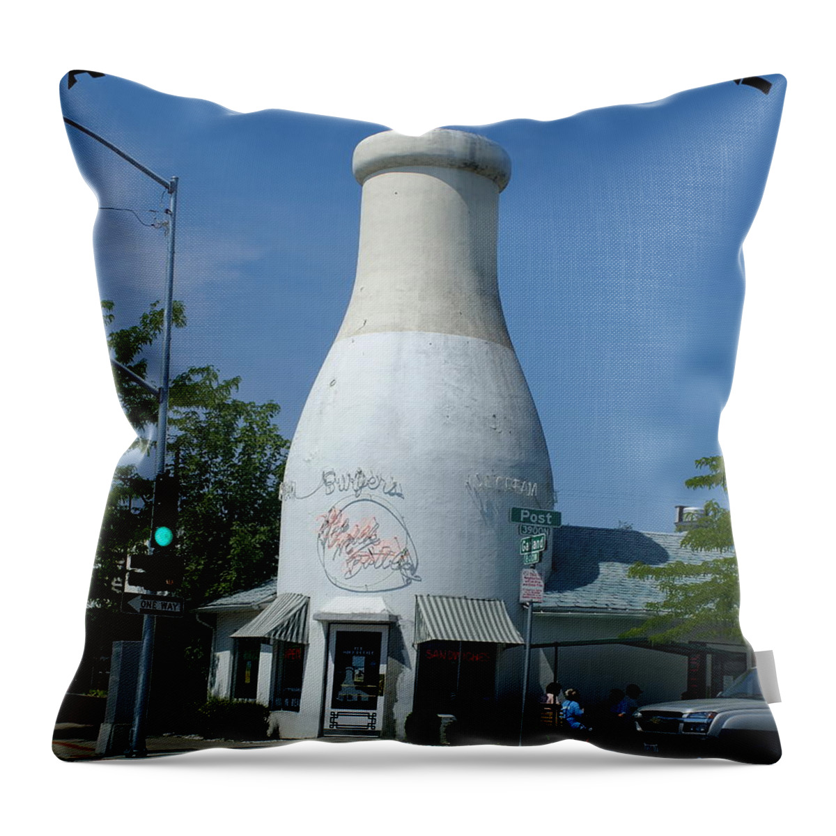 Spokane Throw Pillow featuring the photograph A Giant Milk Bottle in Spokane by Ben Upham III