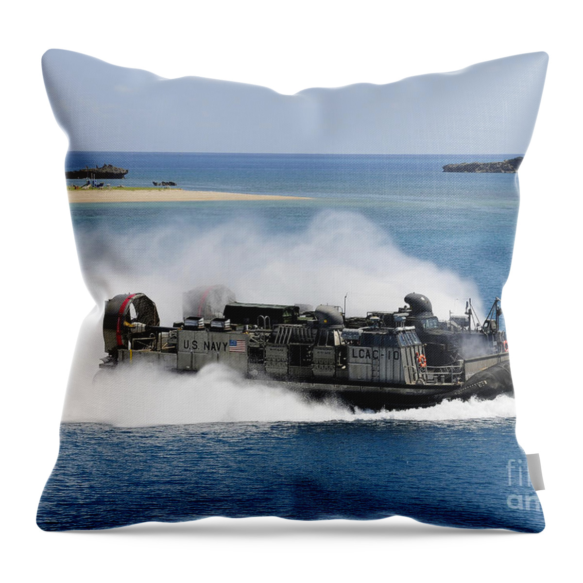 Us Navy Throw Pillow featuring the photograph A Landing Craft Air Cushion Approaches by Stocktrek Images