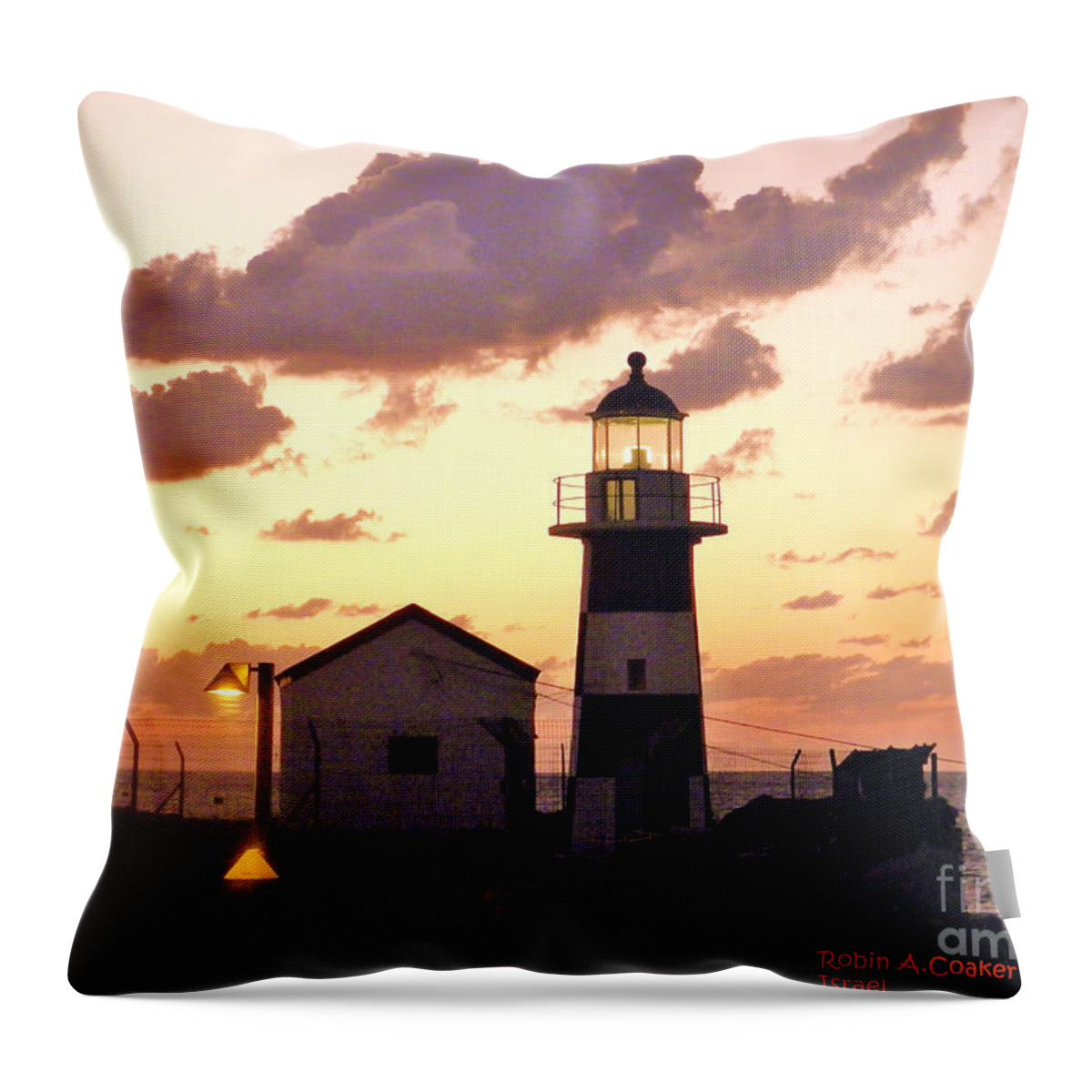 A Light House In Israel Throw Pillow featuring the photograph A Light House in Israel by Robin Coaker