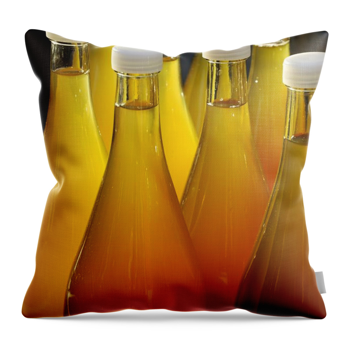 Bottles Throw Pillow featuring the photograph Apple juice in bottles by Matthias Hauser