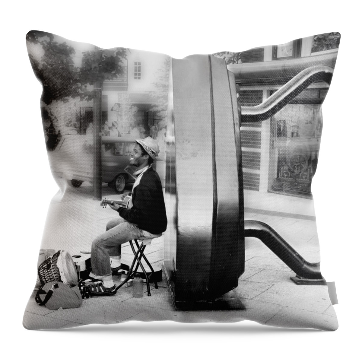 Street Musician Throw Pillow featuring the photograph ATown Street Musician by Gray Artus