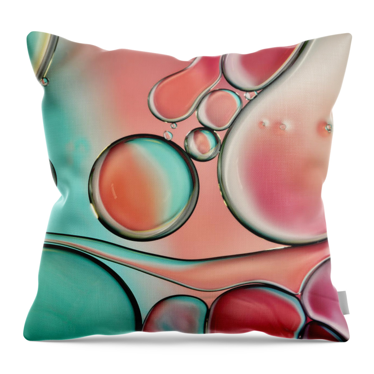 Oil Throw Pillow featuring the photograph Bubble Abstract with Cyan and Pink by Sharon Johnstone