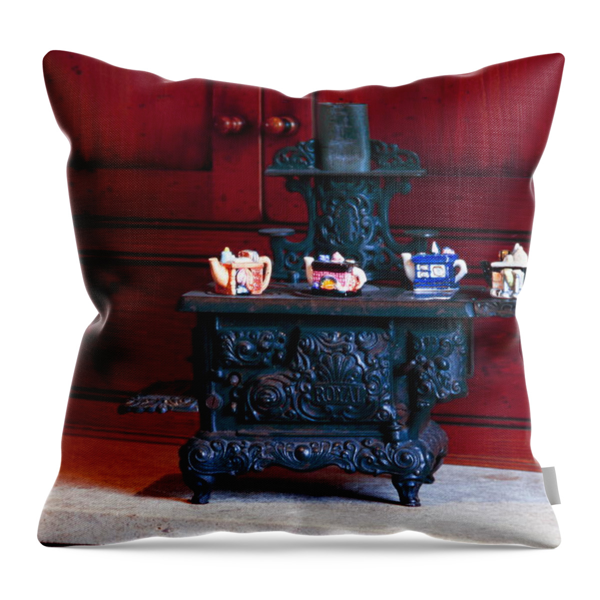 Miniature Cast Iron Stove Throw Pillow featuring the photograph Cast Iron Stove with Teapots by Sally Weigand