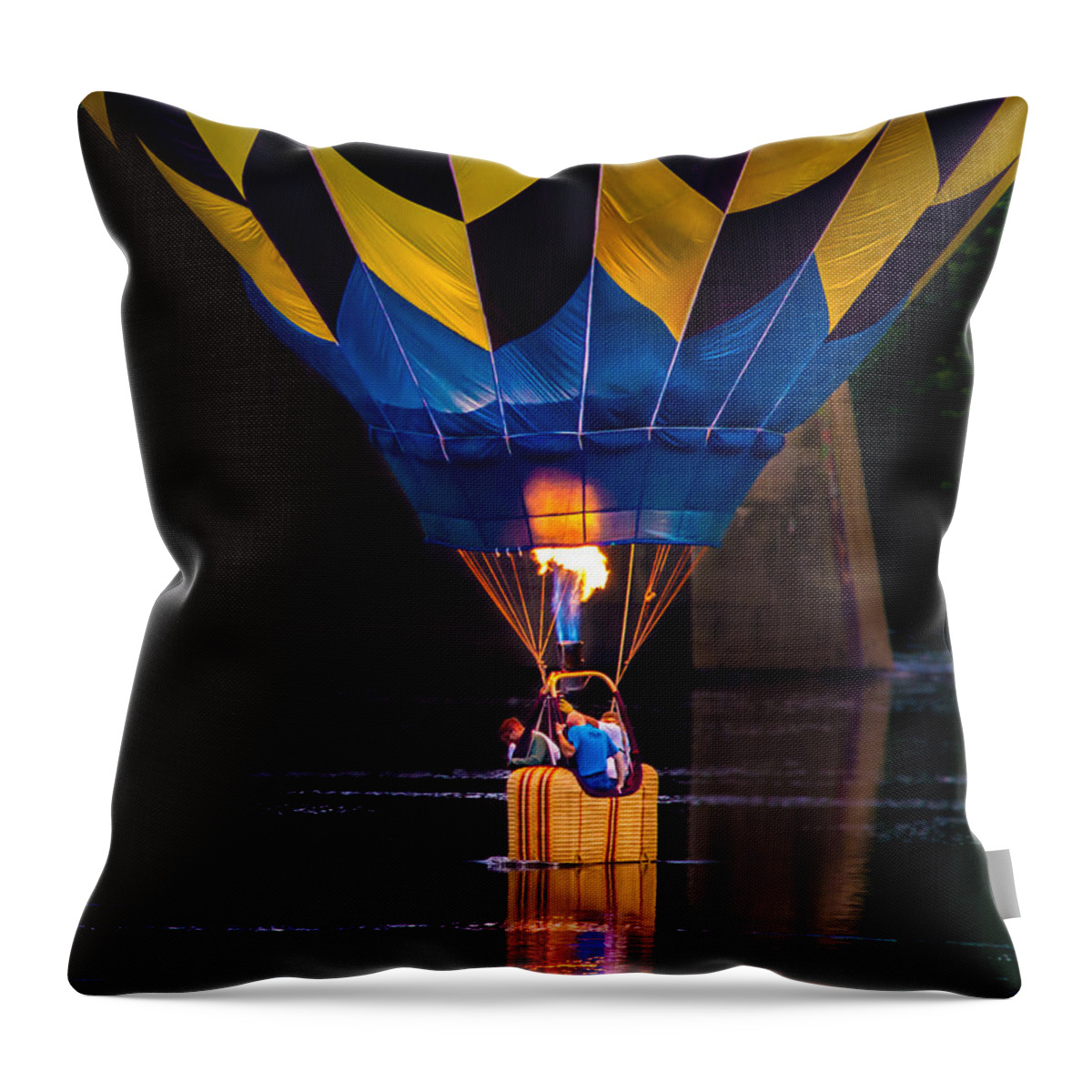 Water Scraping Throw Pillow featuring the photograph Dipping The Balloon Basket by Bob Orsillo
