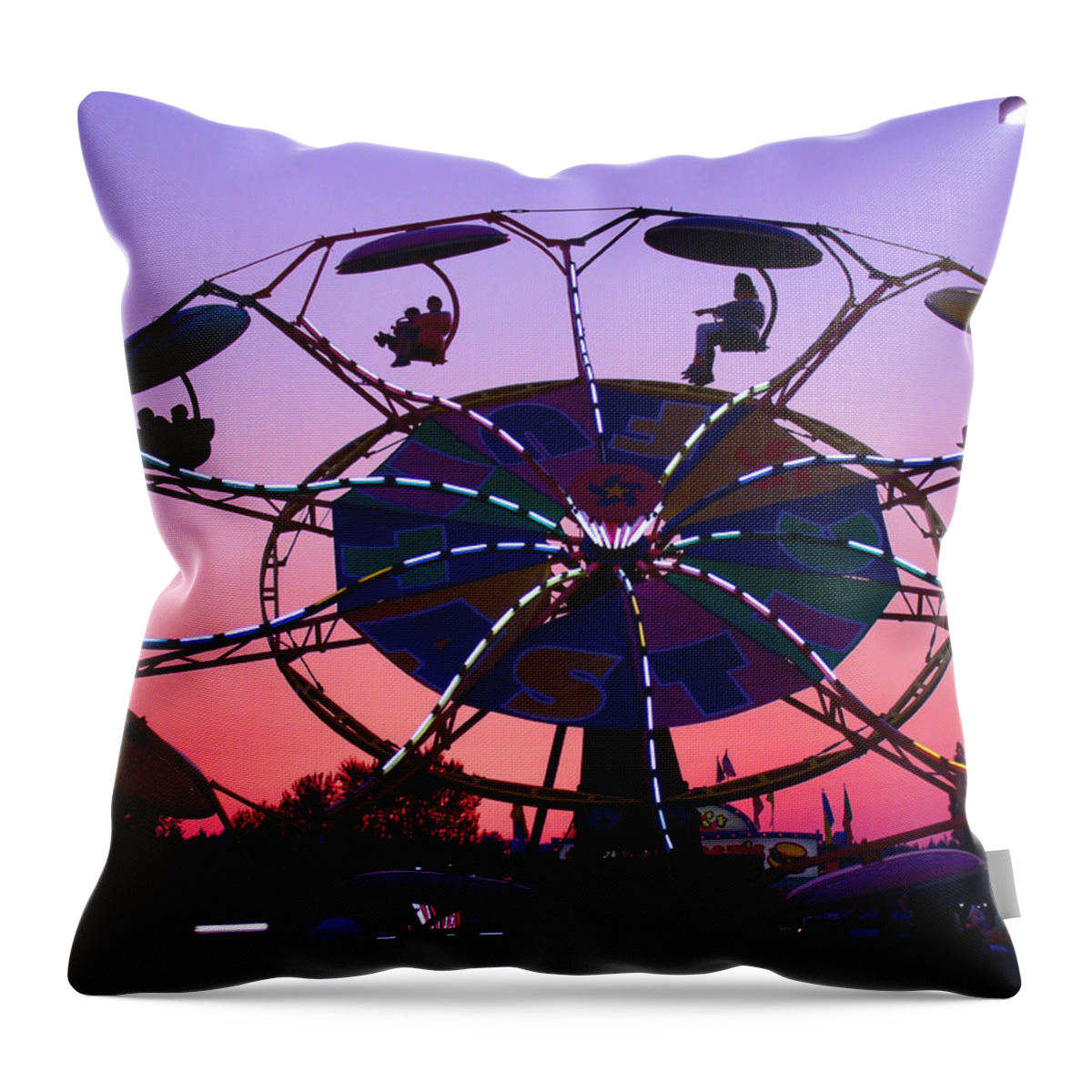 Amusement Park Rides Throw Pillow featuring the photograph Fast Fun Ride At Sunset by Kym Backland