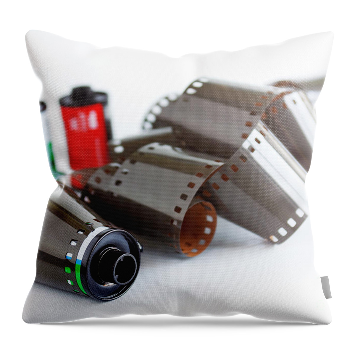 35mm Throw Pillow featuring the photograph Film and Canisters by Carlos Caetano
