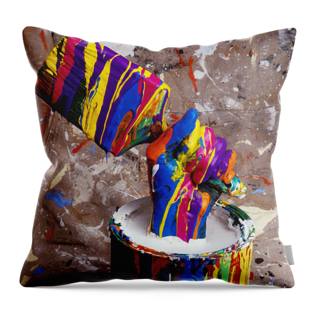 Hand Throw Pillow featuring the photograph Hand coming out of paint bucket by Garry Gay