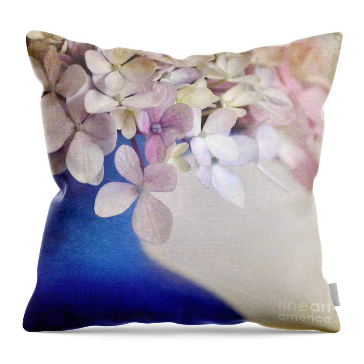 Hydrangeas Throw Pillow featuring the photograph Hydrangeas in deep blue vase by Lyn Randle