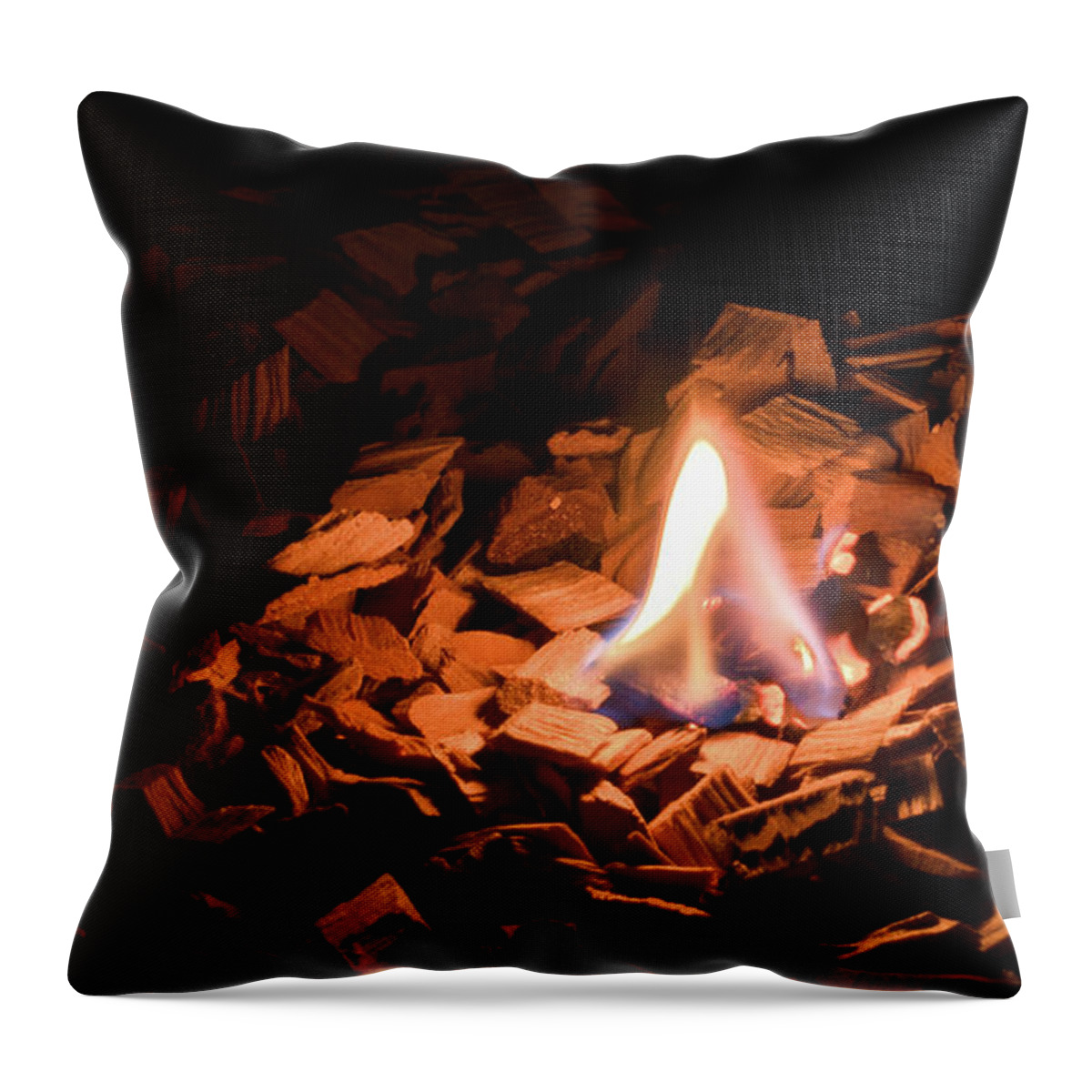 Background Throw Pillow featuring the photograph Light of fire creates coziness ... by Michael Goyberg
