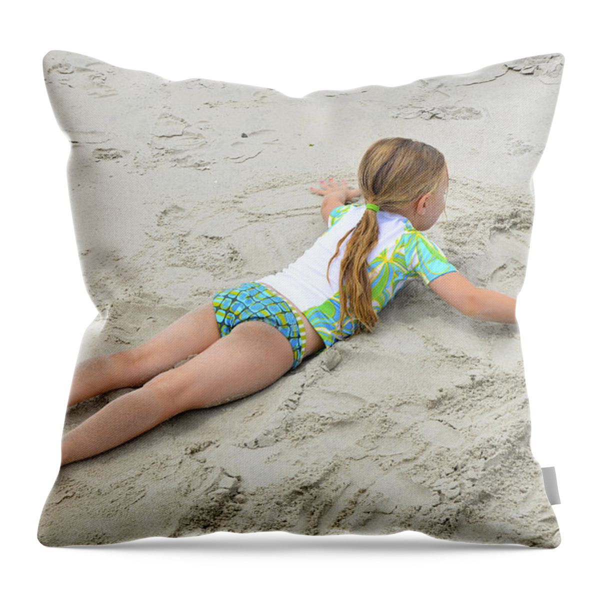 Sand Throw Pillow featuring the photograph Making a Sand Angel by Maureen E Ritter