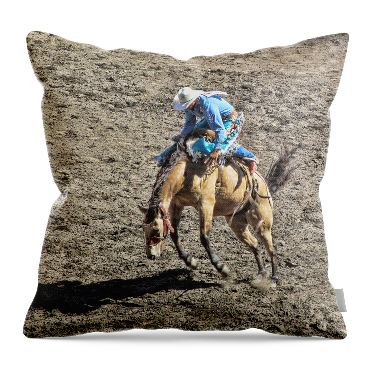 Rodeo Throw Pillow featuring the photograph Saddle Back Bronc Riding by Ron Roberts