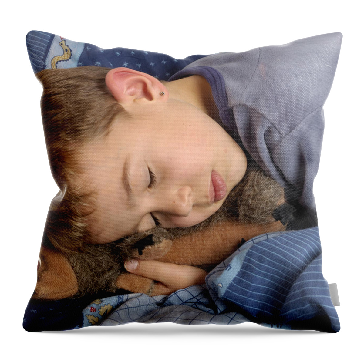 Sleeping Throw Pillow featuring the photograph Sleeping child by Matthias Hauser