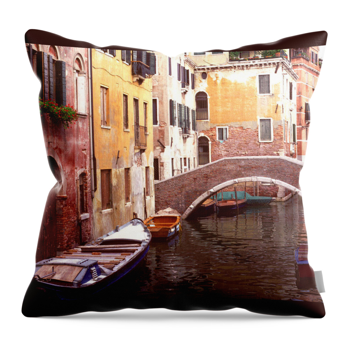 Pastels Throw Pillow featuring the photograph Venice Bridge over a Small Canal. by Tom Wurl