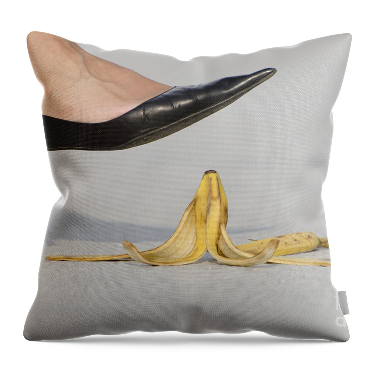 Banana Peel Throw Pillow featuring the photograph Walking on banana peel by Mats Silvan
