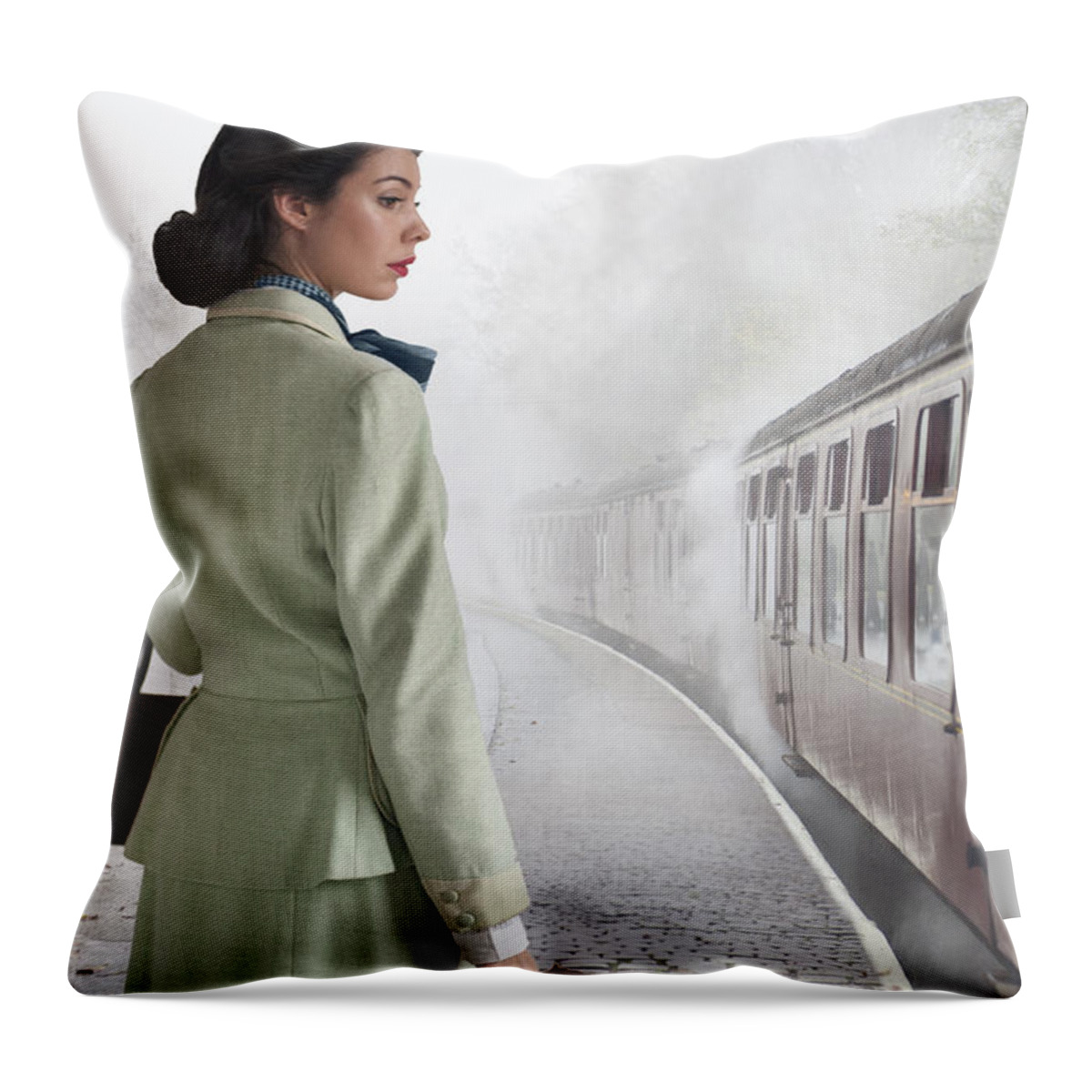 Woman Throw Pillow featuring the photograph 1940's Woman On A Railway Platform With Steam Train by Lee Avison