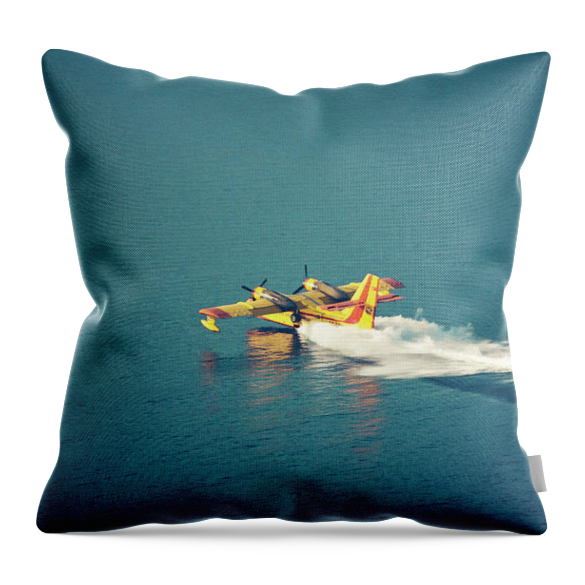Aerospace Throw Pillow featuring the photograph Aircraft firefighter take water in the sea #1 by Raimond Klavins