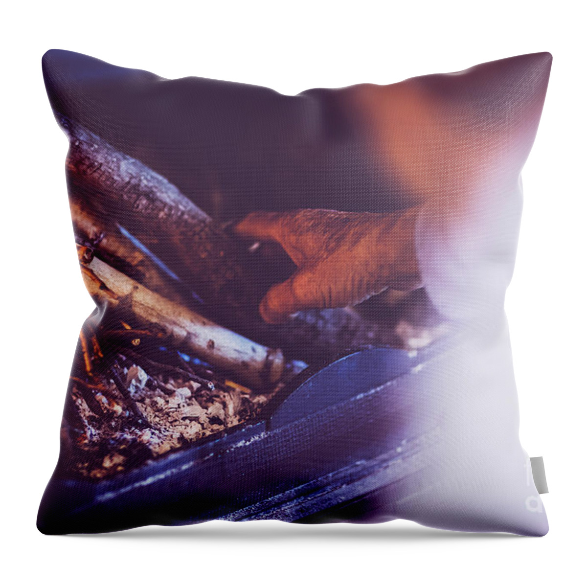 Arm Throw Pillow featuring the photograph Man kindle a fire in the fireplace #1 by Anna Om