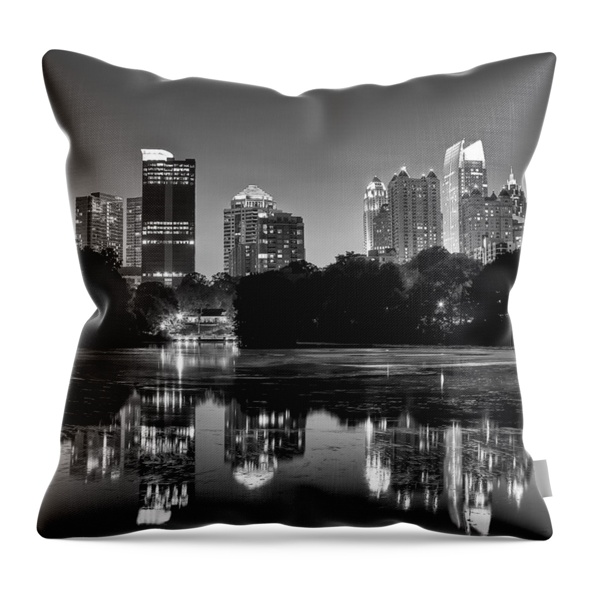 Night Throw Pillow featuring the photograph Night Atlanta.Piedmont Park lake. #1 by Anna Rumiantseva