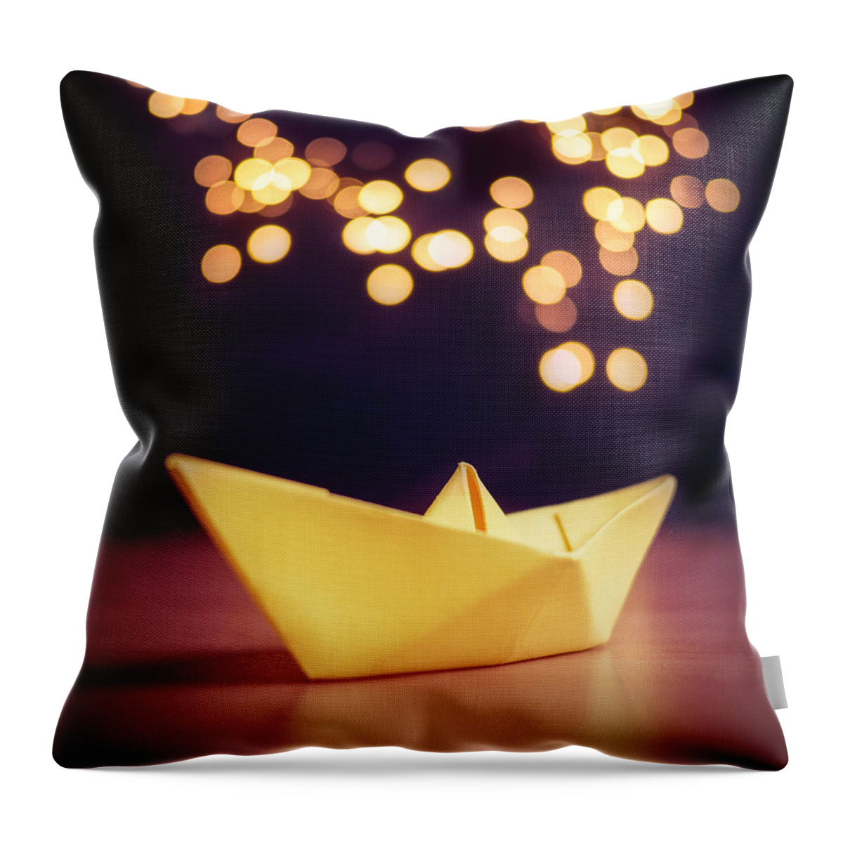 Paperboat Lights Bokeh Throw Pillow featuring the photograph Paper Boat Lights #1 by Janine Pauke