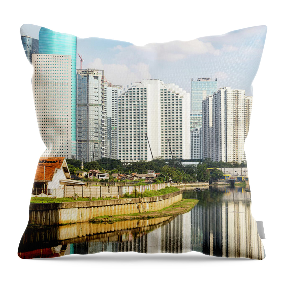Capital Cities Throw Pillow featuring the photograph Tall buildings reflection in water in Jakarta business district #1 by Didier Marti