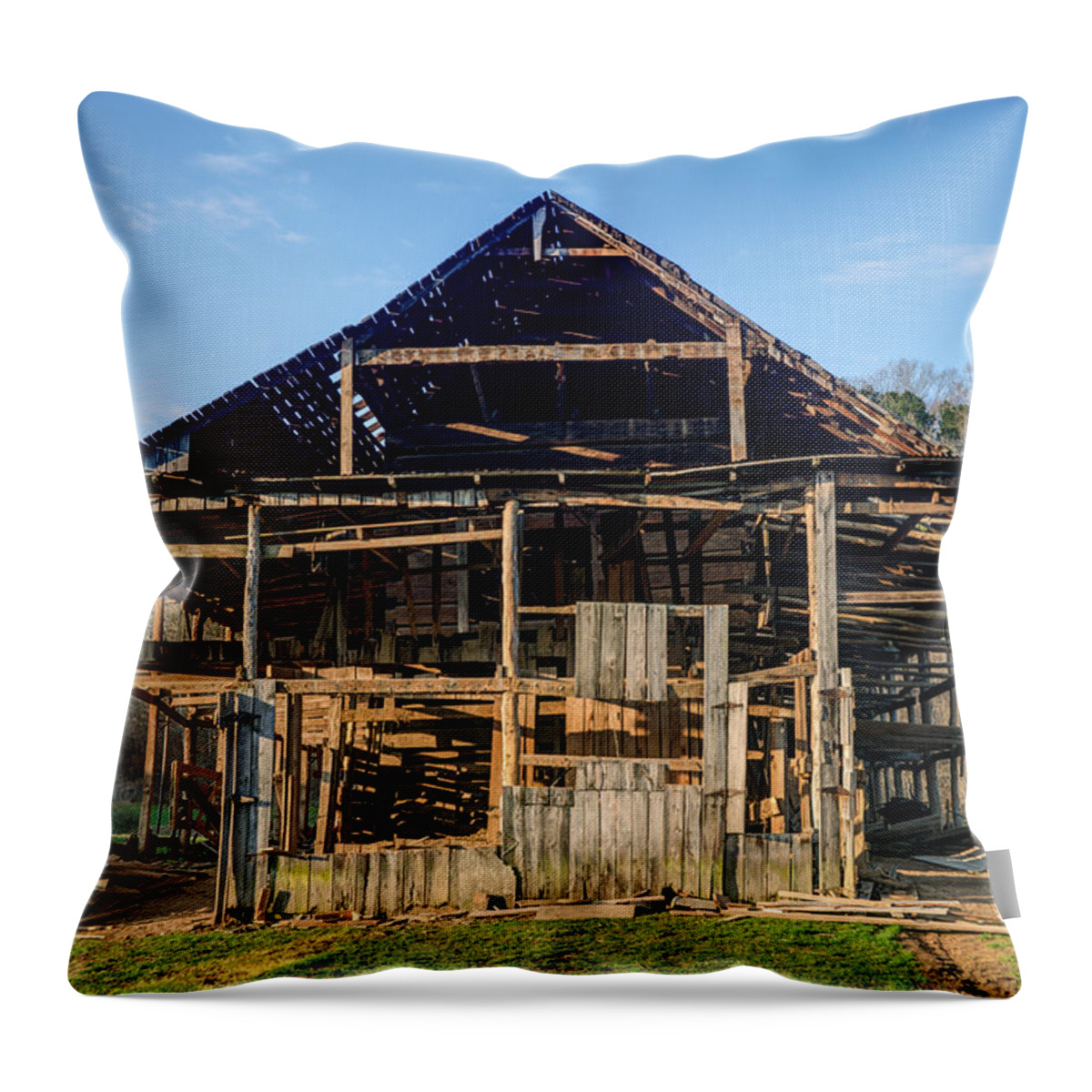 1800s Throw Pillow featuring the photograph 1800s Barn Being Dismantled by Douglas Barnett