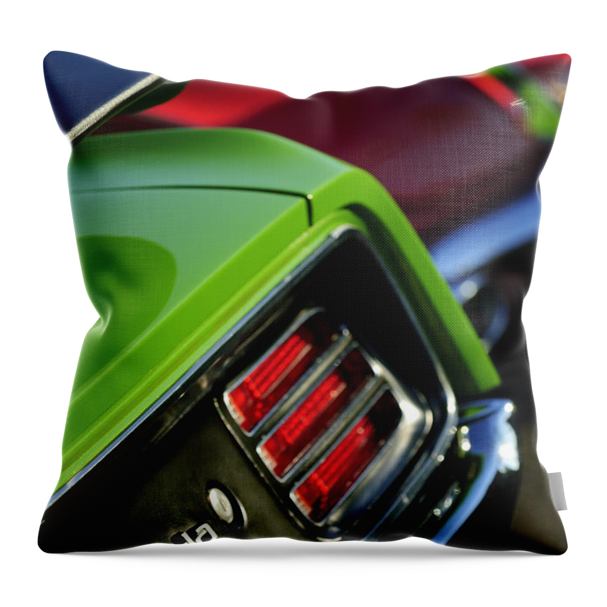 1970 Plymouth Barracuda Cuda Throw Pillow featuring the photograph 1970 Plymouth Barracuda Cuda Taillight Emblem by Jill Reger