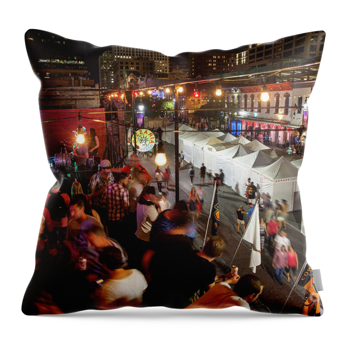 6th Street Throw Pillow featuring the photograph A 6th Street rooftop bar is a perfect perch from where to enjoy the famous famous rooftop lounges by Dan Herron