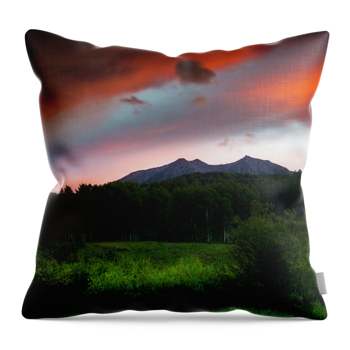 Colorado Throw Pillow featuring the photograph A Colorado Mountain Sunset by John De Bord