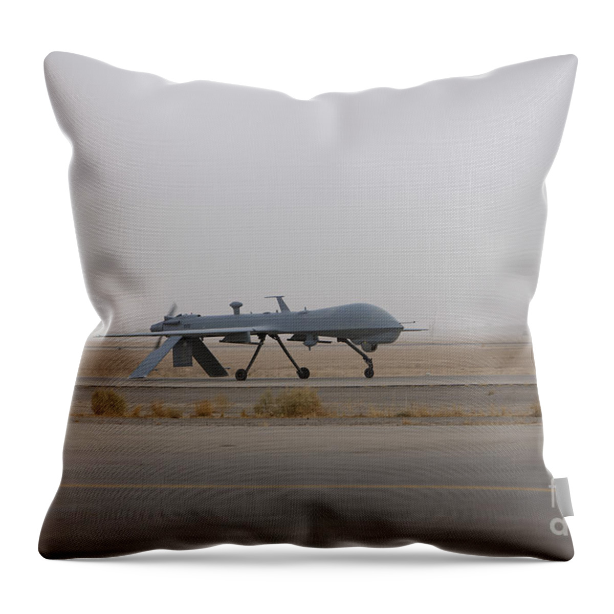 Aviation Throw Pillow featuring the photograph A Mq-1c Warrior Taxis Out To The Runway by Terry Moore