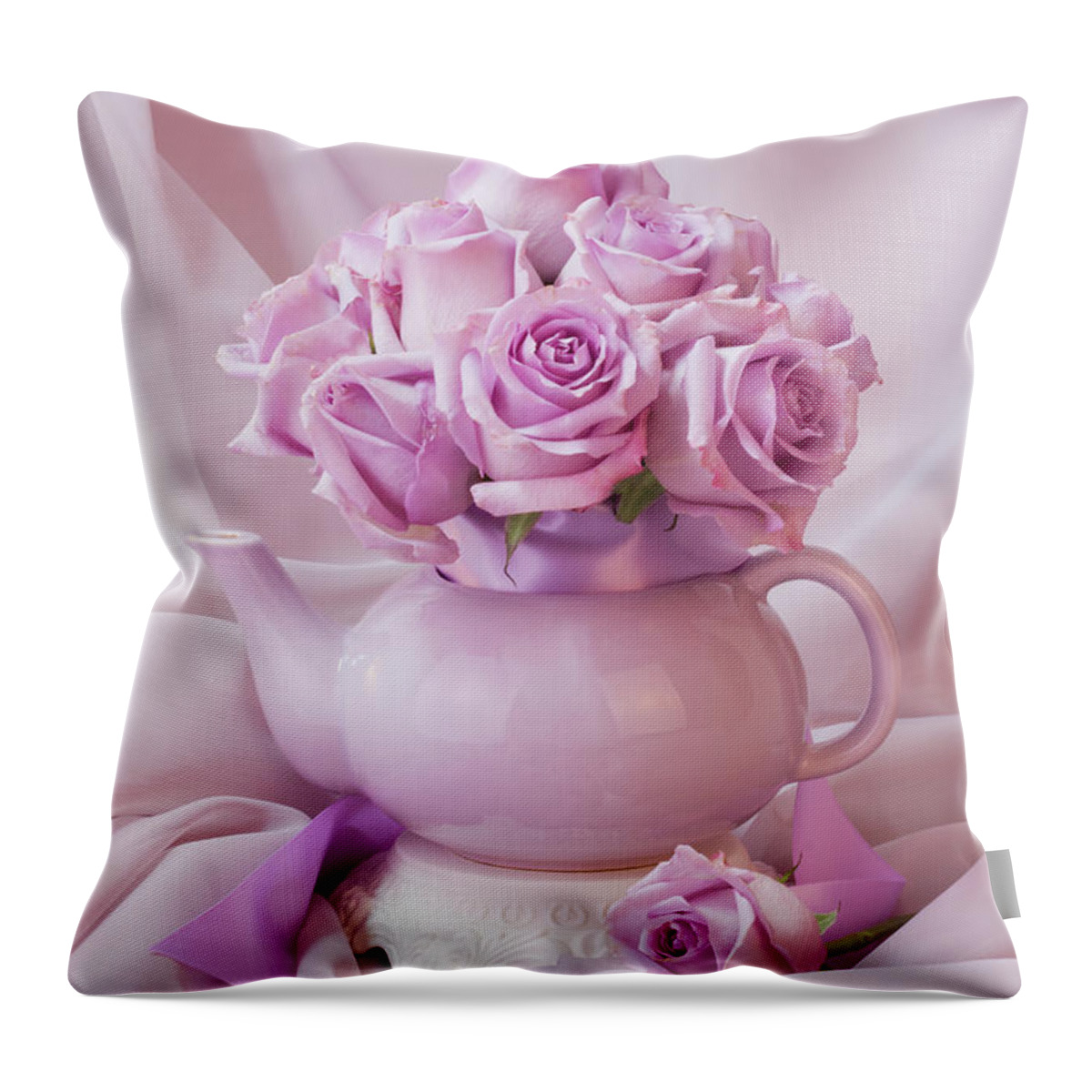 Roses Throw Pillow featuring the photograph A Tea Pot Of Lavender Pink Roses by Sandra Foster