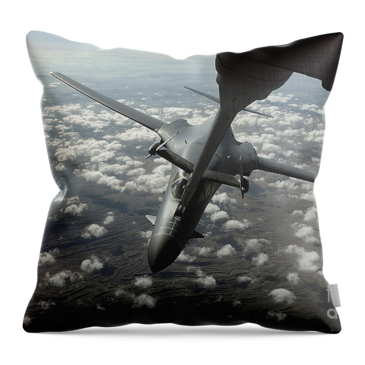 In-flight Throw Pillow featuring the photograph A U.s. Air Force Kc-10 Refuels A B-1b by Stocktrek Images