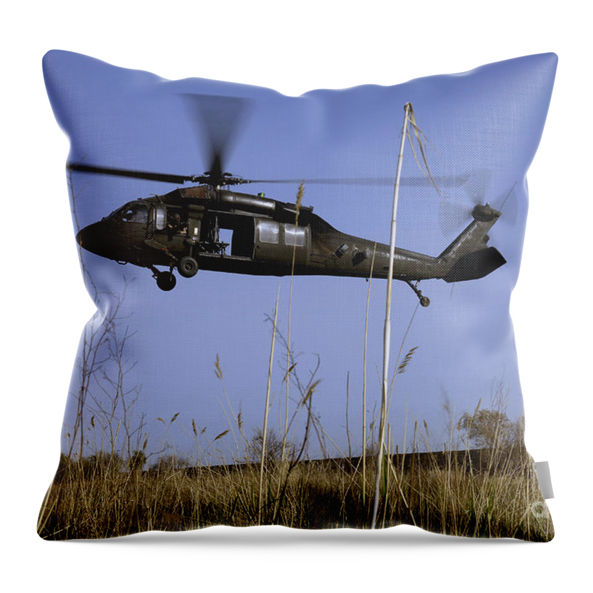 Adults Only Throw Pillow featuring the photograph A U.s. Army Uh-60 Black Hawk Helicopter by Stocktrek Images