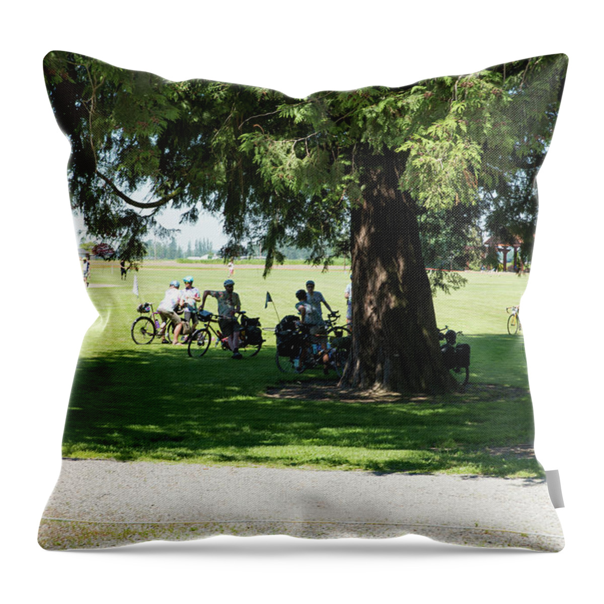 Cyclists Throw Pillow featuring the photograph After the Bike Leg by Tom Cochran