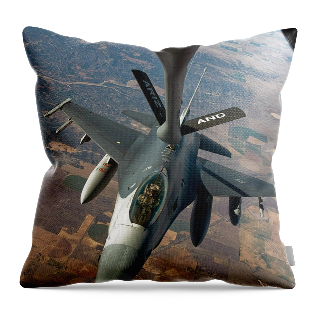 Air-to-air Throw Pillow featuring the photograph An F-16 Fighting Falcon Receiving Fuel by Stocktrek Images
