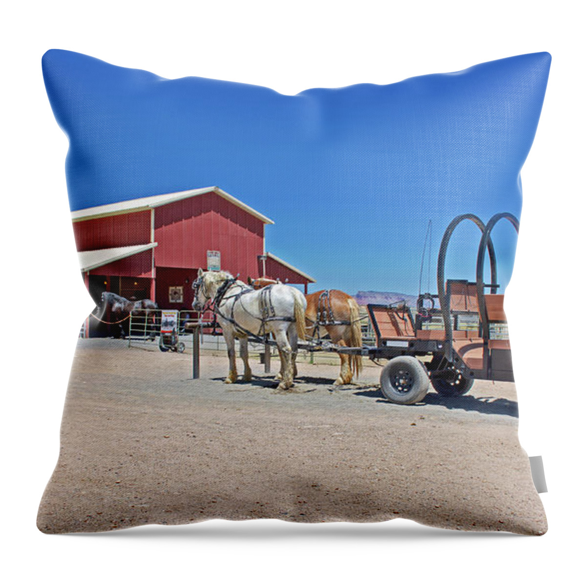 Barn With Horses And Uncovered Wagon On Hualapai Ranch In Grand Canyon West Throw Pillow featuring the photograph Barn with Horses and Uncovered Wagon on Hualapai Ranch in Grand Canyon West, Arizona by Ruth Hager